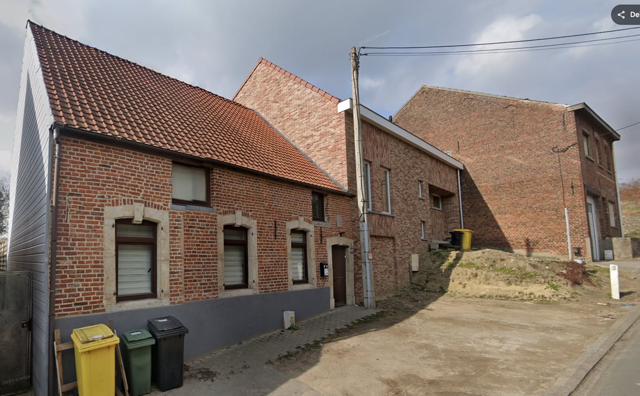 Herbouwde bakstenen woning in beschermd erfgoedgebied